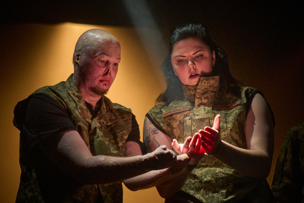 Ukrainian war veterans, many of whom sustained severe injuries in combat during Russia's full-scale invasion of Ukraine, perform during a premiere on Thursday, Feb. 19, 2026, in Kyiv, Ukraine. (AP Photo/Efrem Lukatsky)