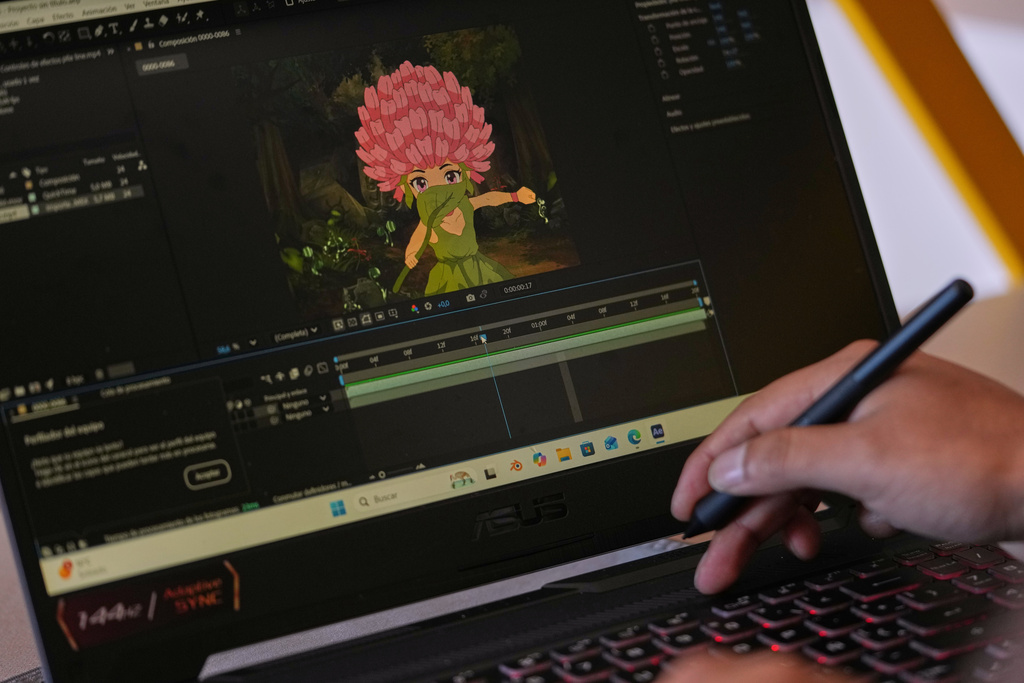 Yarik Sisa, an artist with Yay Animación, works on "Aya Somos," the first Quichua animated short, blending Otavalo culture with Japanese-style anime, in Hatun Rumi, Ecuador, Wednesday, Dec. 3, 2025. (AP Photo/Dolores Ochoa)