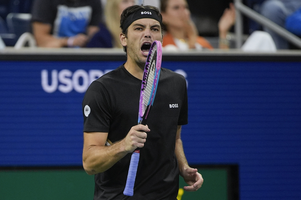 Taylor Fritz, of the United States, reacts after a rally against Tomas Machac, of the Czech Republic, during the fourth round of the U.S. Open tennis championships, Sunday, Aug. 31, 2025, in New York. (AP Photo/Pamela Smith)