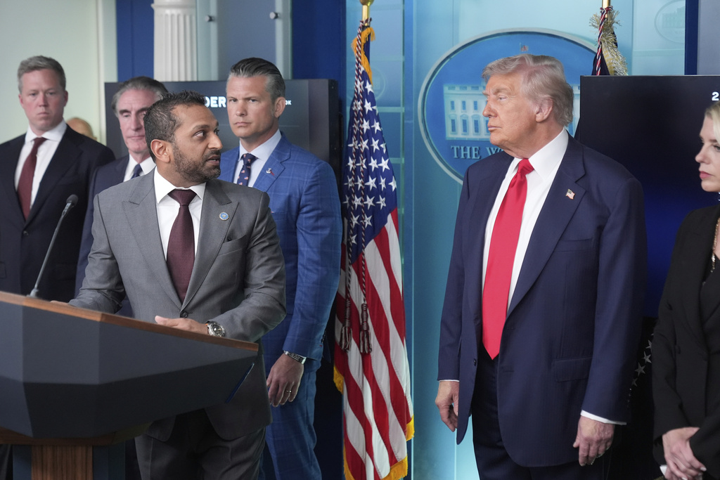 FBI Director Kash Patel speaks as Attorney General Pam Bondi, from right, President Donald Trump, Defense Secretary Pete Hegseth, Interior Secretary Doug Burgum and Army Secretary Dan Driscoll listen in the James Brady Press Briefing Room at the White House, Monday, Aug. 11, 2025, in Washington. (AP Photo/Mark Schiefelbein)
