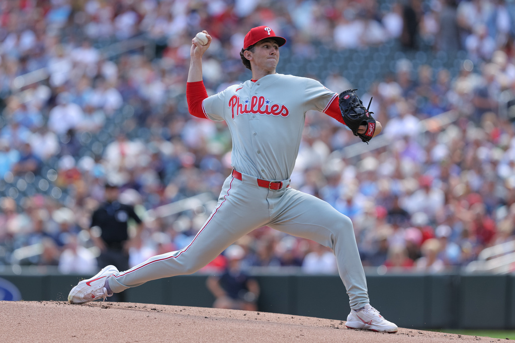 Philadelphia Phillies starting pitcher Andrew Painter delivers during the first inning of a baseball game against the Minnesota Twins, Sunday, Aug. 16, 2026, in Minneapolis. (AP Photo/Bailey Hillesheim)