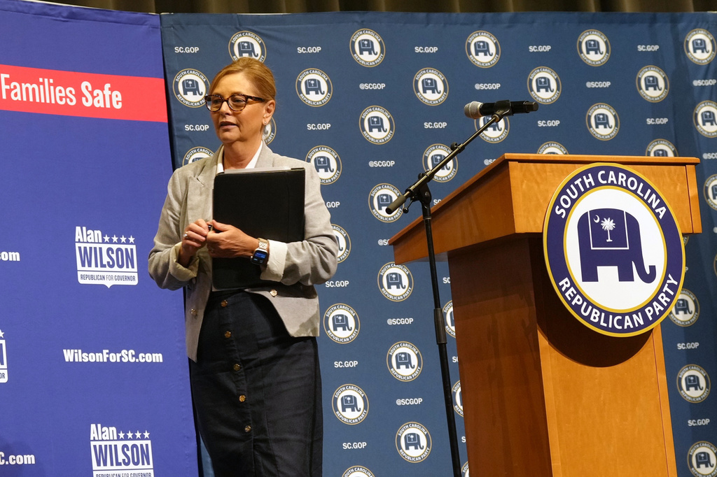 Sen. Darline Graham, R-S.C., leaves the stage after speaking at a South Carolina Republican Senate candidate stump event ahead of the special GOP primary to replace her late brother, Sen. Lindsey Graham, R-S.C., Saturday, Aug. 1, 2026, in Lexington, S.C. (AP Photo/Meg Kinnard)