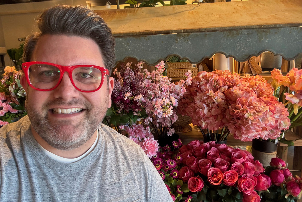 FILE - This undated photo provided by Jeremy Rice shows Rice at House, a home-décor shop that specializes in artificial flower arrangements for the home. in Lexington, Ky. (Jeremy Rice via AP)