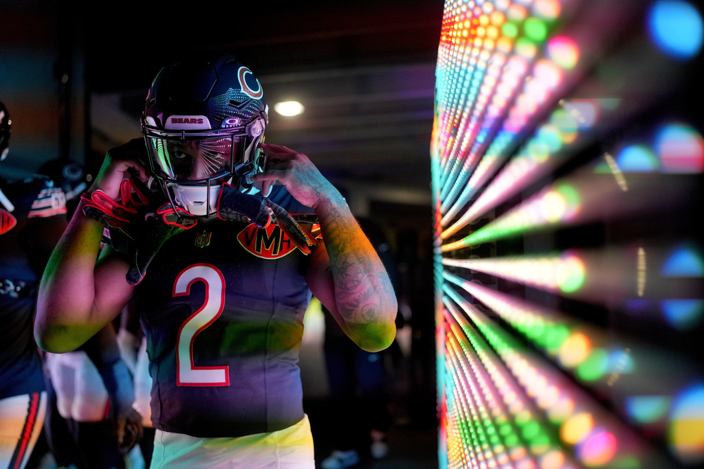 Chicago Bears wide receiver DJ Moore prepares to take the field before an NFL football game against the Minnesota Vikings Monday, Sept. 8, 2025, in Chicago. (AP Photo/Erin Hooley)