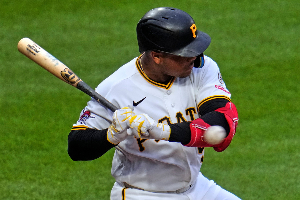 Pittsburgh Pirates' Esmerlyn Valdez is hit by a pitch from Arizona Diamondbacks' Merrill Kelly during the fourth inning of a baseball game in Pittsburgh, Monday, July 27, 2026. (AP Photo/Gene J. Puskar)