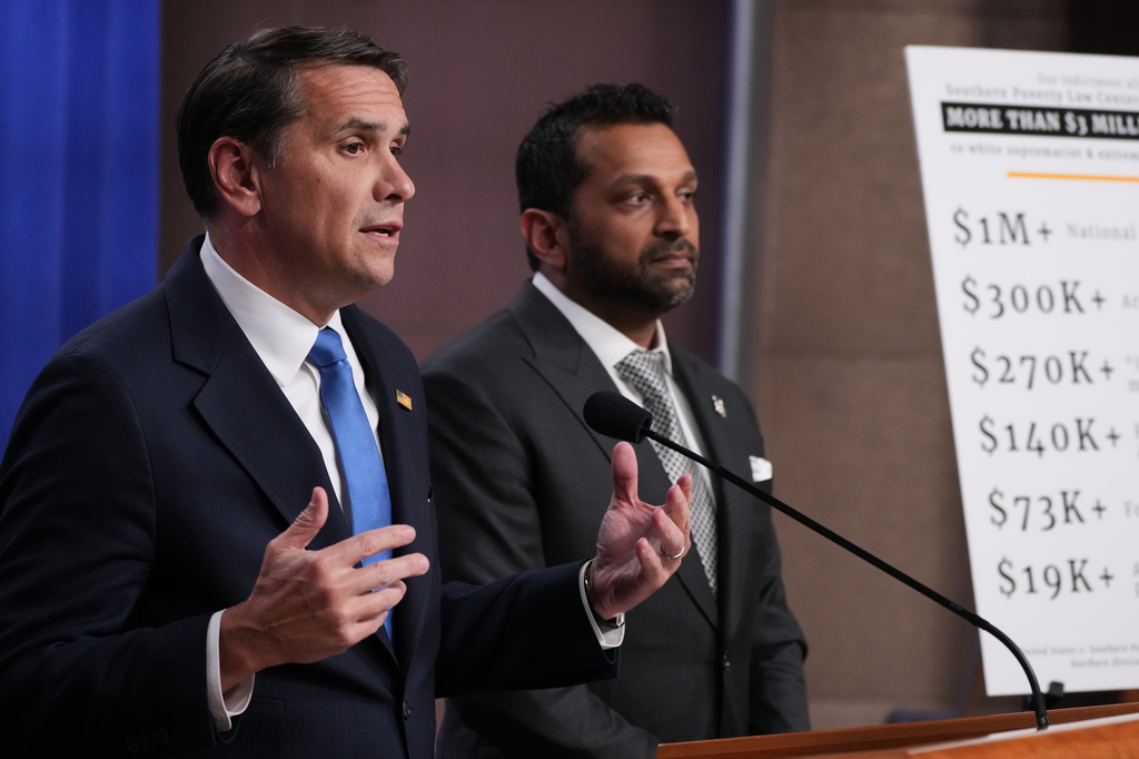 Acting Attorney General Todd Blanche speaks as FBI Director Kash Patel listens during a news conference at the Justice Department, Tuesday, April 21, 2026, in Washington. (AP Photo/Jacquelyn Martin)