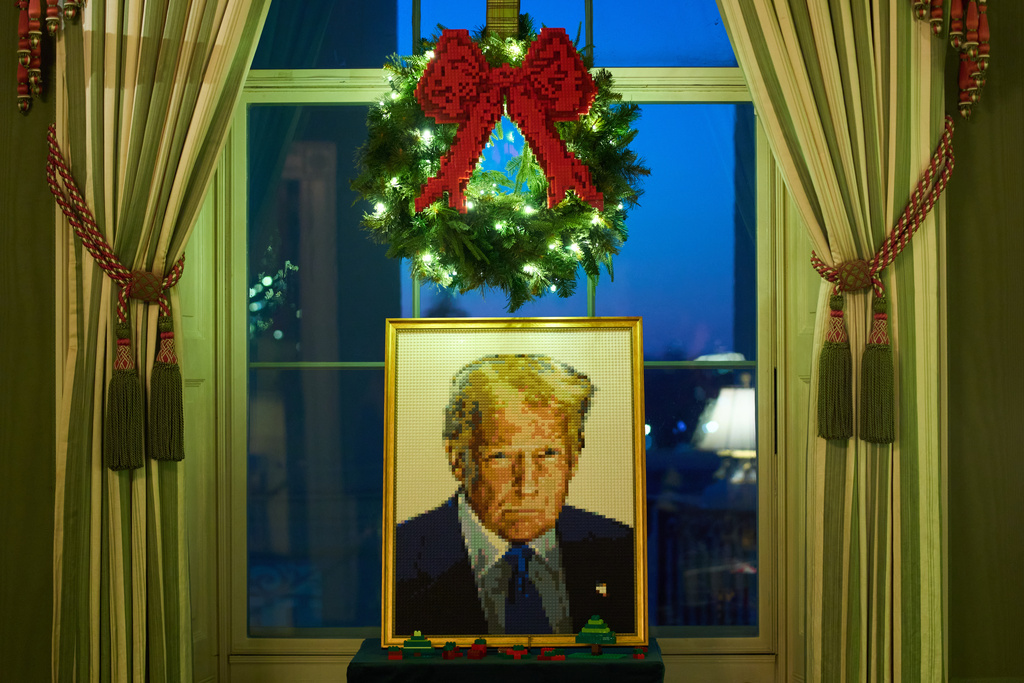 A Lego portrait of President Donald Trump decorates the Green Room of the White House during a press preview of the Christmas decorations "Home is Where the Heart Is," Monday, Dec. 1, 2025, in Washington. (AP Photo/Evan Vucci)
