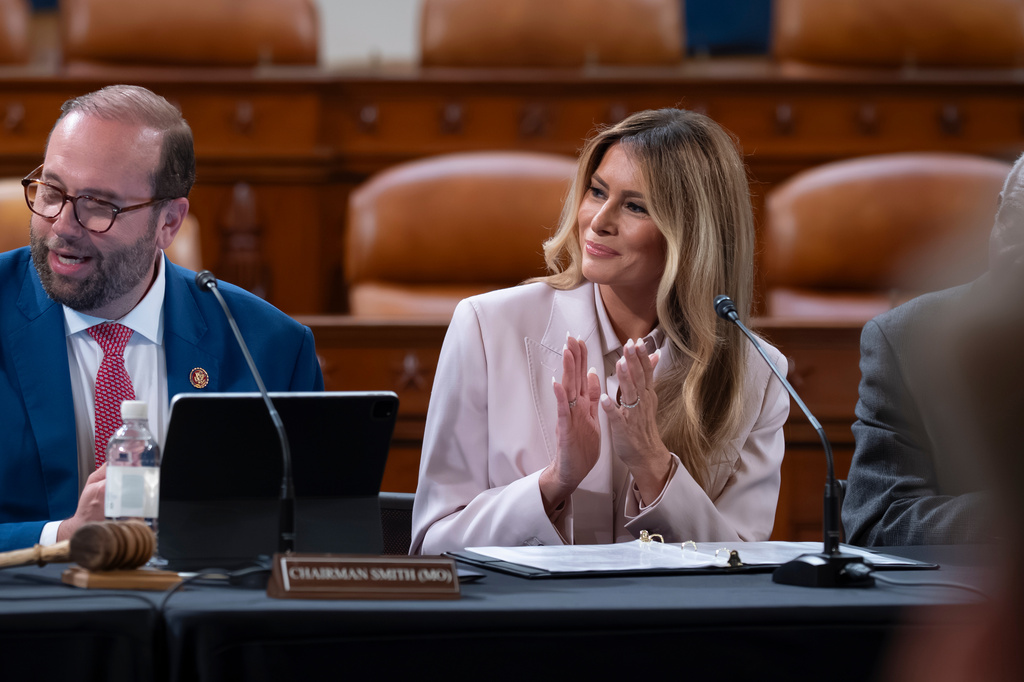 First lady Melania Trump, joined by Rep. Jason Smith, R-Mo., chair of the House Ways and Means Committee, left, speaks to advance her legislative initiative on protecting America's foster care children, at a committee roundtable, at the Capitol in Washington, Wednesday, April 15, 2026. (AP Photo/J. Scott Applewhite)