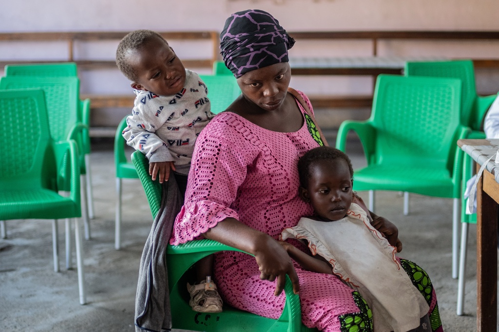 Irene Nabudeba, pregnant, mother of 5, waits for a consultation that used to be free at the Afia Himbi Hospital in Goma, Democratic Republic of Congo, Nov. 11, 2025. (AP Photo/Moses Sawasawa)