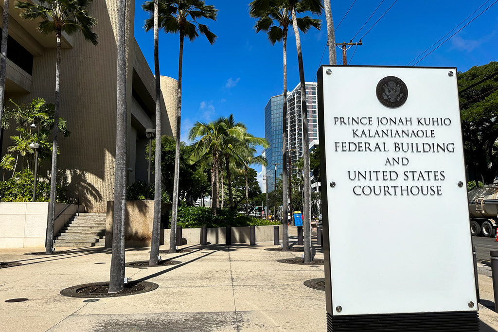 FILE - A sign for the Prince Jonah Kuhio Kalanianaole Federal Building and Courthouse is displayed outside the courthouse on Jan. 22, 2024, in Honolulu. (AP Photo/Jennifer Kelleher, File)