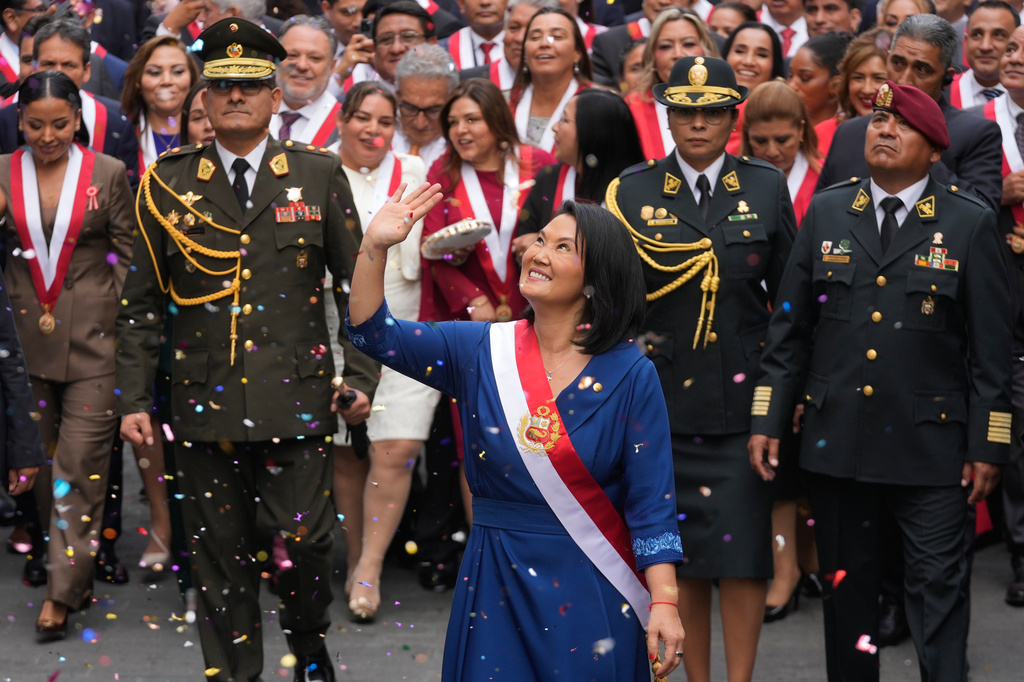 Peru's President Keiko Fujimori walks to the presidential palace after her inauguration in Lima, Peru, Tuesday, July 28, 2026. (AP Photo/Martin Mejia)