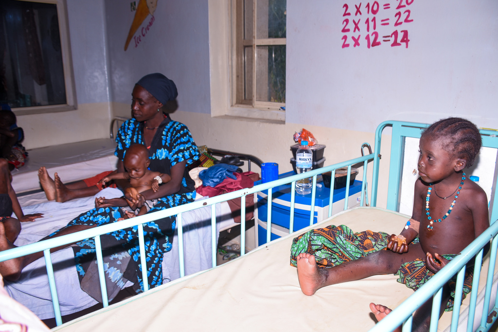 Women and children who were rescued after being held in a forest after they were abducted from the Woro community by gunmen in February receive medical attention at a hospital in Ilorin, Nigeria, Friday, Aug. 7, 2026. (AP Photo/Abubakar Khadijat)