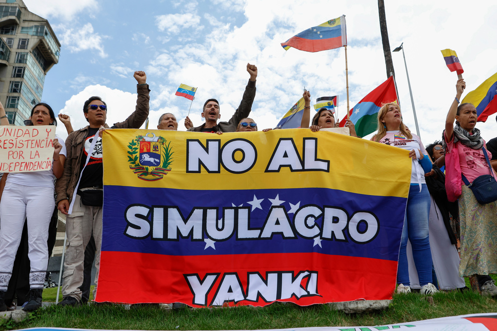 Government supporters protest against a U.S. emergency and air evacuation drill conducted at the U.S. Embassy in Caracas, Venezuela, Saturday, May 23, 2026. (AP Photo/Pedro Mattey)