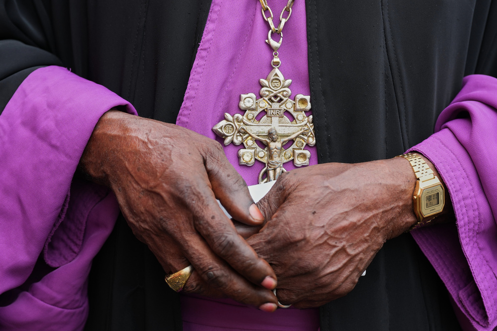 Faithful attend Holy Mass with Pope Leo XIV at the Malabo Stadium in Malabo, Equatorial Guinea, Thursday, April 23, 2026. (AP Photo/Misper Apawu)
