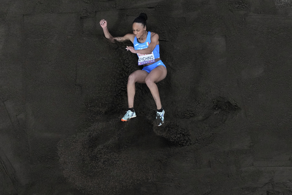 Italy's Larissa Iapichino makes an attempt in the women's long jump qualification at the World Athletics Championships in Tokyo, Saturday, Sept. 13, 2025. (AP Photo/Bernat Armangue)