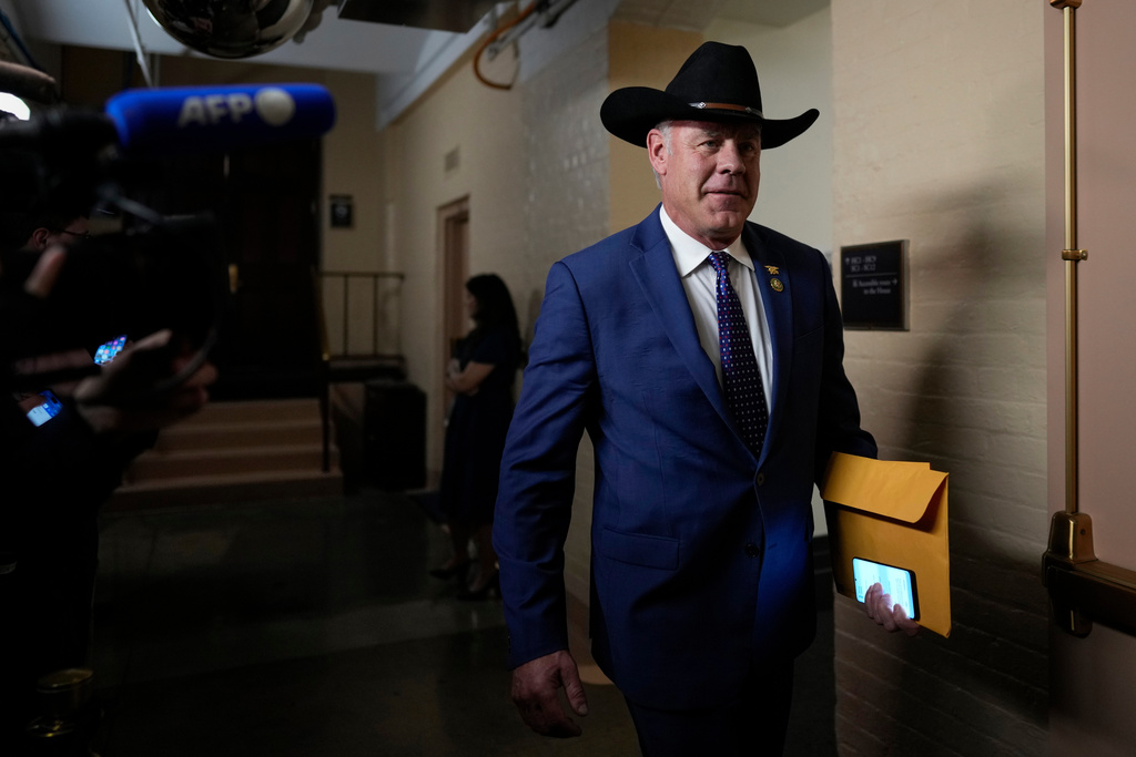 FILE - Rep.-elect Ryan Zinke, R-Mont., walks from a closed-door meeting with the GOP Conference during the opening day of the 118th Congress at the U.S. Capitol in Washington, Jan 3, 2023. (AP Photo/Carolyn Kaster, File)