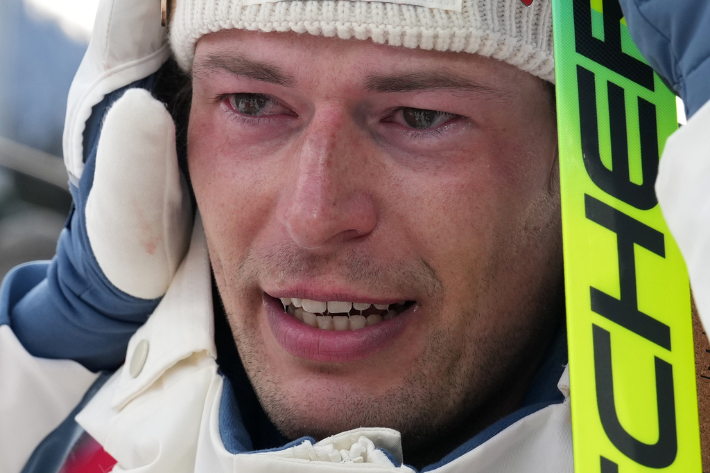 Sturla Holm Laegreid, of Norway, reacts after he won bronze in the men's 20-kilometer individual biathlon race at the 2026 Winter Olympics in Anterselva, Italy, Tuesday, Feb. 10, 2026. (AP Photo/Andrew Medichini)