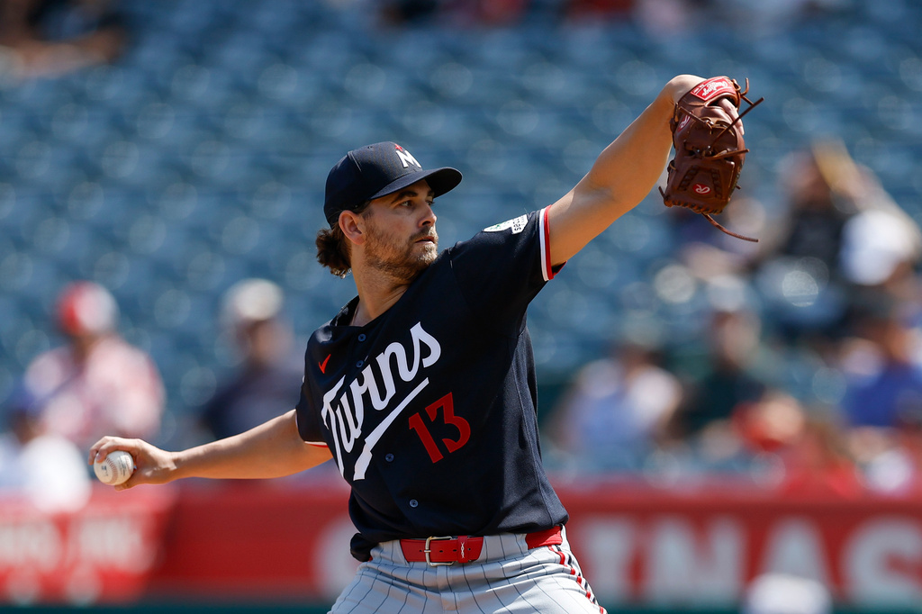 Minnesota Twins starting pitcher Dean Kremer throws during the first inning of a baseball game against the Los Angeles Angels, Sunday, Sept. 20, 2026, in Anaheim, Calif. (AP Photo/Caroline Brehman)
