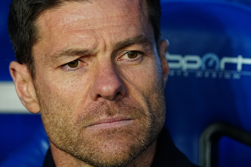 Real Madrid's head coach Xabi Alonso waits for the start of the Spanish La Liga soccer match between Alaves and Real Madrid in Vitoria-Gasteiz, Spain, Sunday, Dec. 14, 2025. (AP Photo/Miguel Oses)