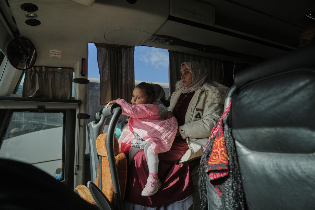 Palestinian patients ride a bus in Khan Younis as they travel to the Rafah crossing to leave the Gaza Strip for medical treatment abroad, Tuesday, Feb. 3, 2026. (AP Photo/Jehad Alshrafi)