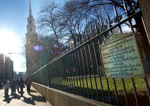 FILE - A marker signifying the burial place of Paul Revere appears on the fence at the Old Granary Burying Ground in Boston on Dec. 31, 2003. (AP Photo/Chitose Suzuki, File) FILE - A marker signifying the burial place of Paul Revere appears on the fence at the Old Granary Burying Ground in Boston on Dec. 31, 2003. (AP Photo/Chitose Suzuki, File)