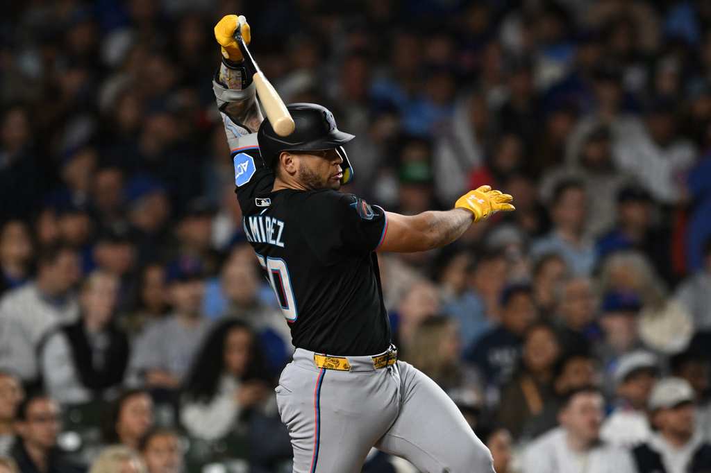 Miami Marlins' Agustin Ramirez watches his RBI single during the fourth inning of a baseball game against the Chicago Cubs Tuesday, Sept. 22, 2026, in Chicago. (AP Photo/Paul Beaty)