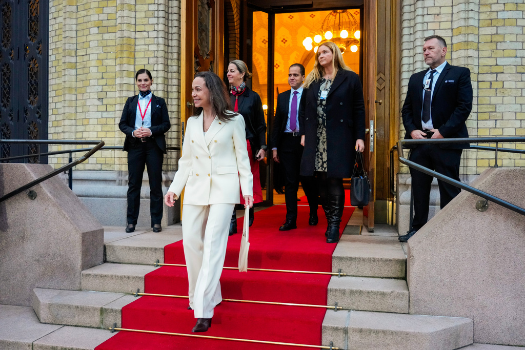 Nobel Peace Prize laureate María Corina Machado, centre, visits the Storting in Oslo, Norway, Thursday, Dec. 11, 2025. (Ole Berg-Rusten/NTB Scanpix, Pool Photo via AP)