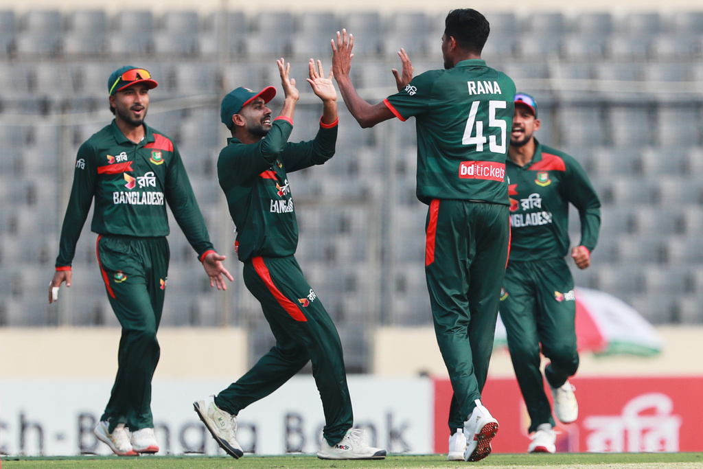 Bangladesh's Nahid Rana, right, celebrates with teammates the wicket of Pakistan's Mohammad Rizwan during the first one day international cricket match between Bangladesh and Pakistan in Mirpur, Bangladesh, Wednesday, March 11, 2026. (AP Photo/Mahmud Hossain Opu)