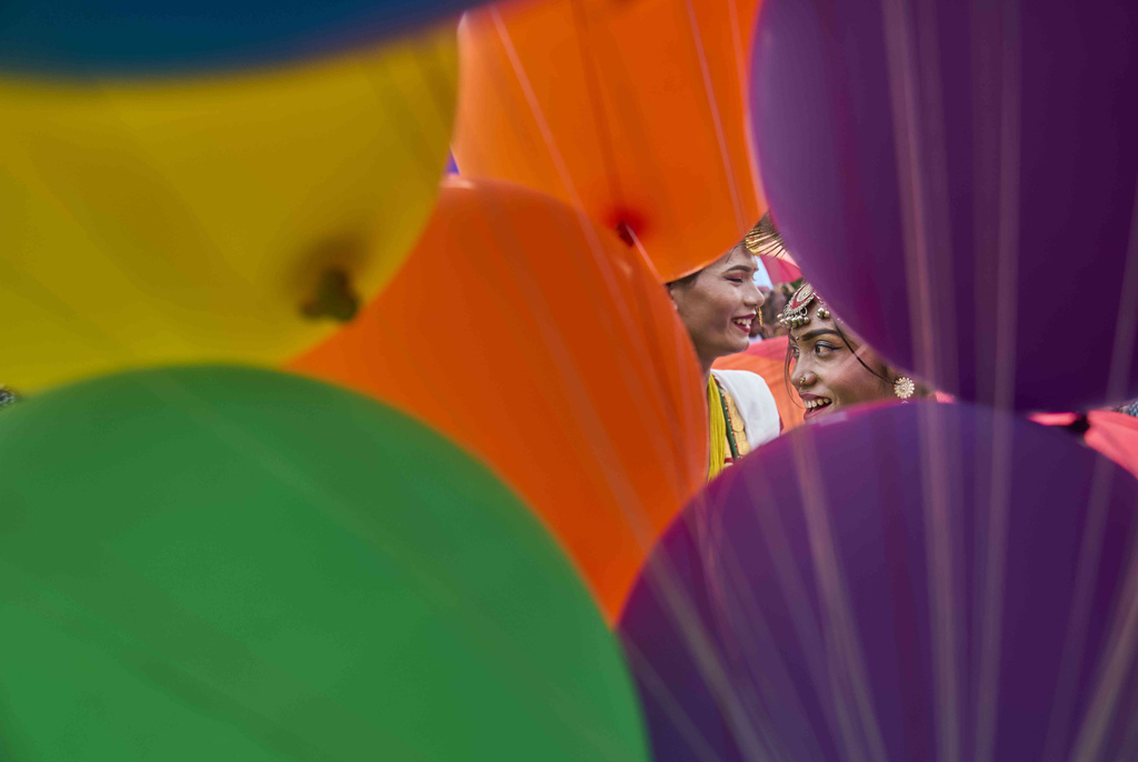 Participants get ready to take part in the Pride Parade in Kathmandu, Nepal, Sunday, Aug. 10, 2025. (AP Photo/Niranjan Shrestha)