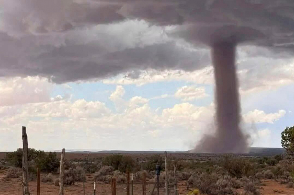In this photo released by the Navajo Police Department, a tornado funnel is seen Sat., Sept. 13, 2025, northeast of Montezuma Creek, Utah. (Navajo Police Department via AP)