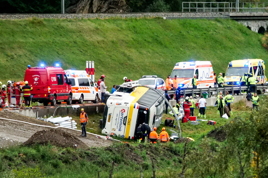 Emergency personnel respond to an accident involving a tour bus near Susch, in the canton of Grisons, Switzerland, on Thursday, Sept. 10, 2026. (Jon Duschletta/Engadiner Post/Keystone via AP)