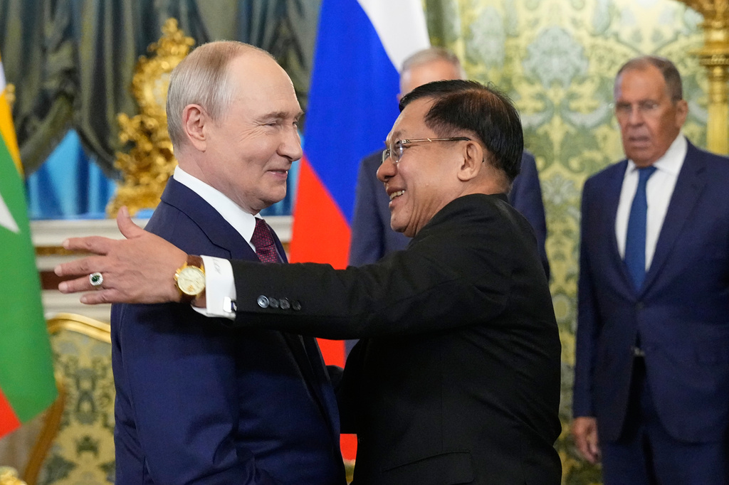 Russian President Vladimir Putin, left, welcomes Myanmar President Min Aung Hlaing during their meeting at the Grand Kremlin Palace, in Moscow, Tuesday, Aug. 18, 2026. (AP Photo/Alexander Zemlianichenko, Pool)