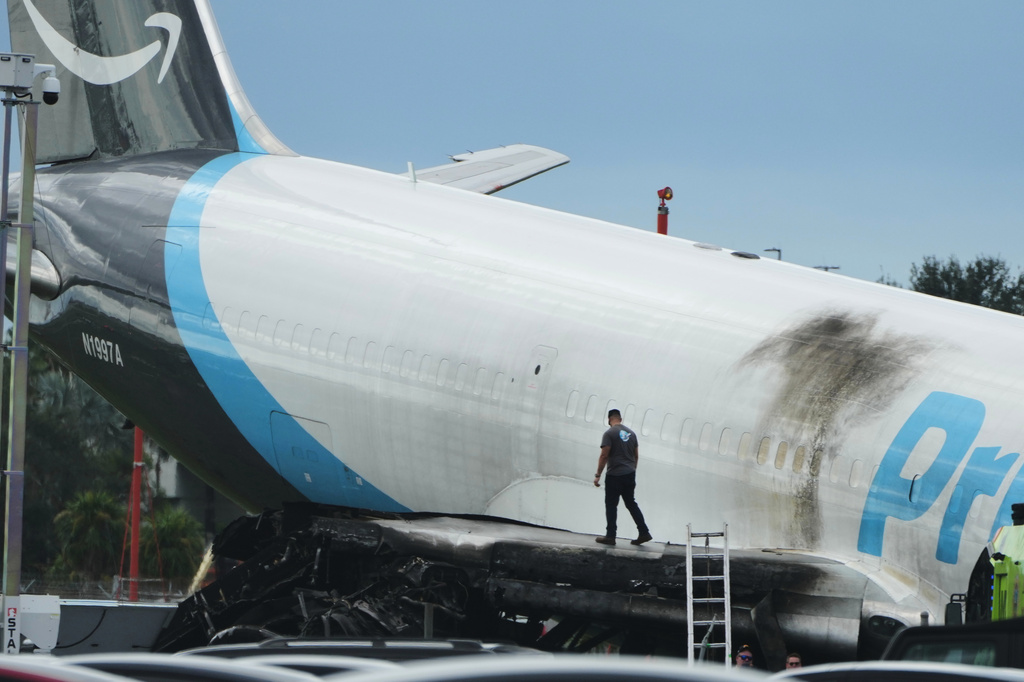 An Amazon cargo plane sits at the Miami International Airport (MIA) Monday, Sept. 7, 2026, after it overshot the runway on Sunday, in Miami. (AP Photo/Lynne Sladky)