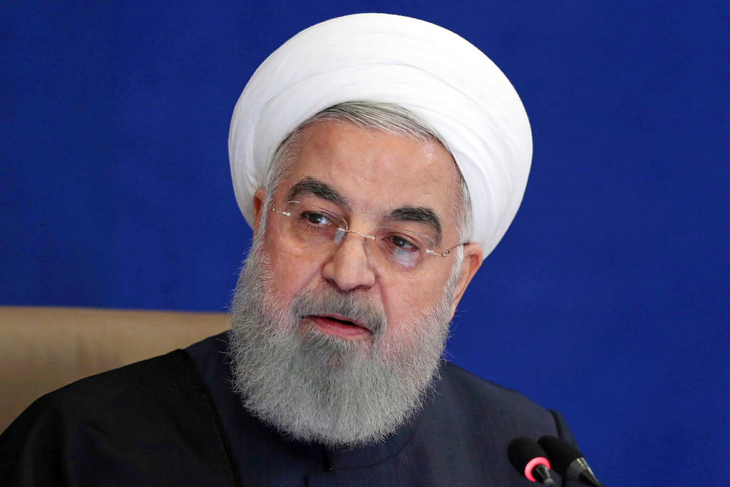 FILE - In this Dec. 9, 2020 file photo, released by the official website of the office of the Iranian Presidency, President Hassan Rouhani speaks, during a meeting in Tehran, Iran. (Iranian Presidency Office via AP, File)