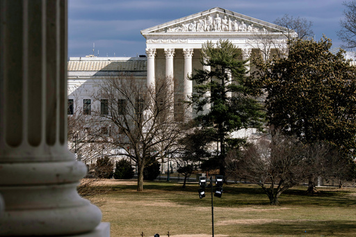 FILE - The Supreme Court is seen in the distance, framed through columns of the U.S. Senate at the Capitol in Washington, Feb. 20, 2025. (AP Photo/J. Scott Applewhite, File) FILE - The Supreme Court is seen in the distance, framed through columns of the U.S. Senate at the Capitol in Washington, Feb. 20, 2025. (AP Photo/J. Scott Applewhite, File)