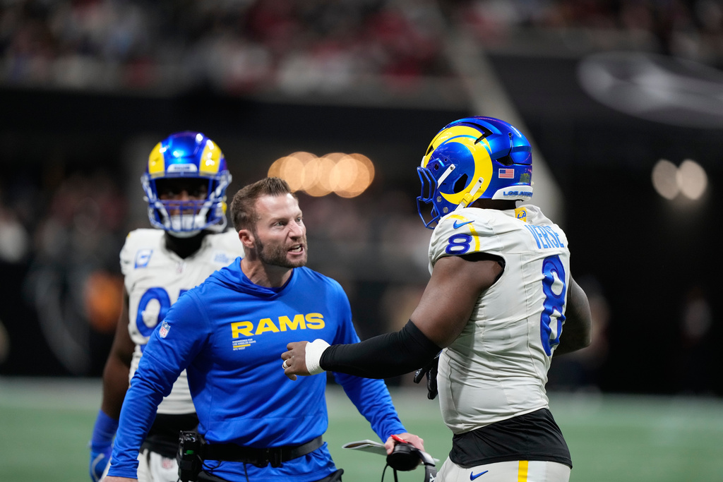Los Angeles Rams head coach Sean McVay congratulates linebacker Jared Verse (8) after he blocked a field goal attempt and returned it for a touchdown in the second half of an NFL football game against the Atlanta Falcons, Monday, Dec. 29, 2025, in Atlanta. (AP Photo/Brynn Anderson)
