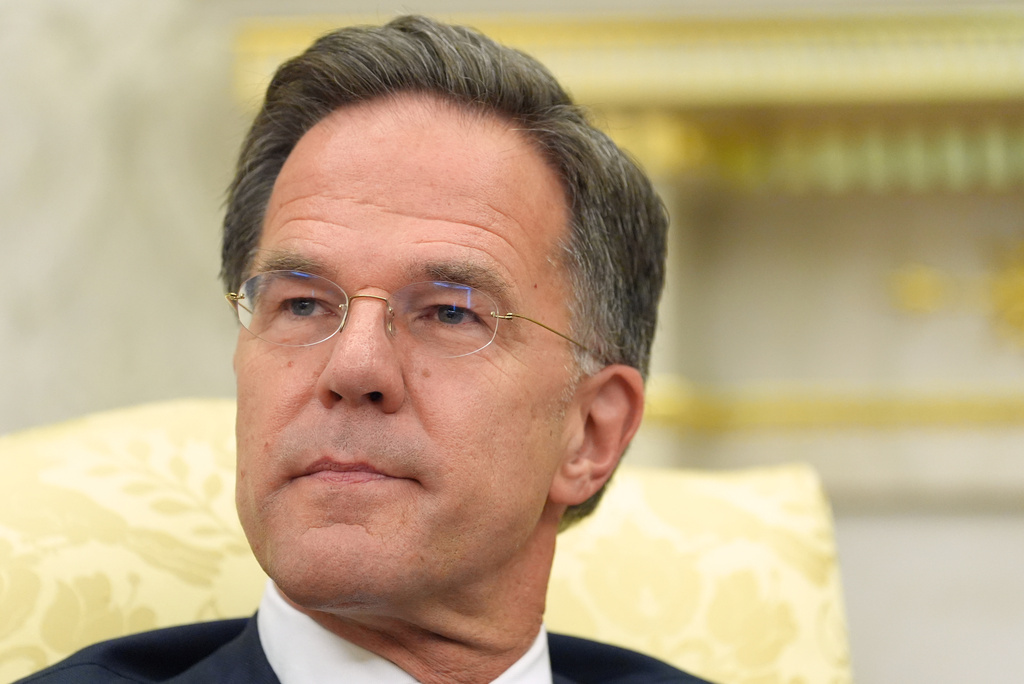 NATO Secretary General Mark Rutte listens as he meets with President Donald Trump n the Oval Office at the White House, Wednesday, June 24, 2026, in Washington. (AP Photo/Jacquelyn Martin)