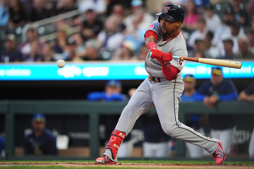 Cleveland Guardians' José Ramírez bats against the Minnesota Twins during the first inning of a baseball game, Friday, Sept. 11, 2026, in Minneapolis. (AP Photo/Ellen Schmidt)