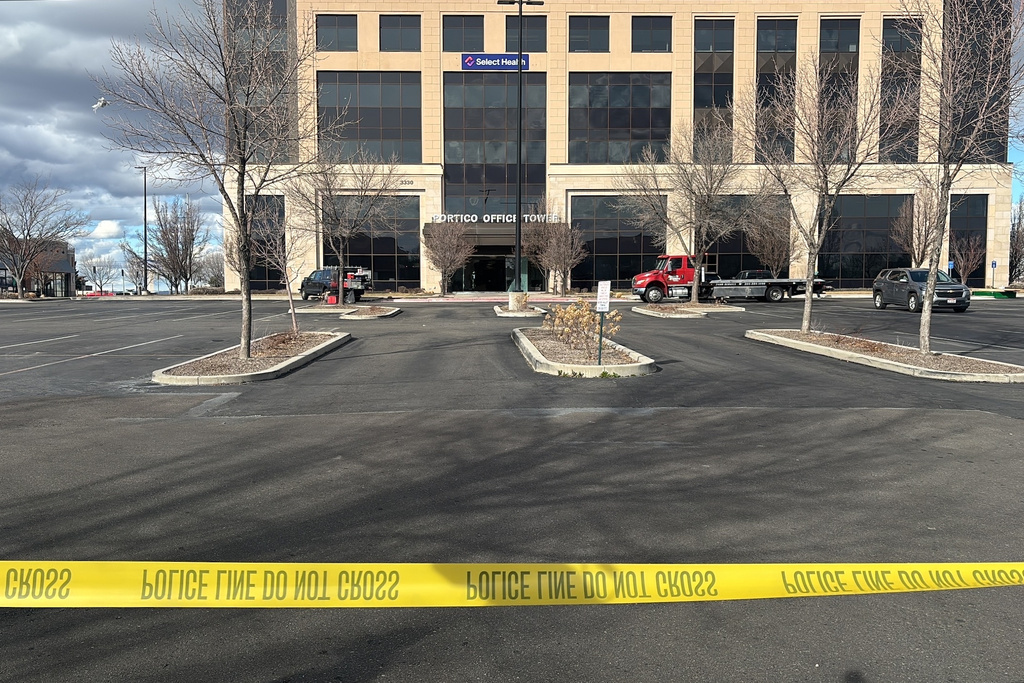 This photo provided by Idaho News 6 shows police tape on the scene where a stolen ambulance was driven into the Portico North building Thursday, Feb. 19, 2026, in Meridian, Idaho. (Idaho News 6 via AP)