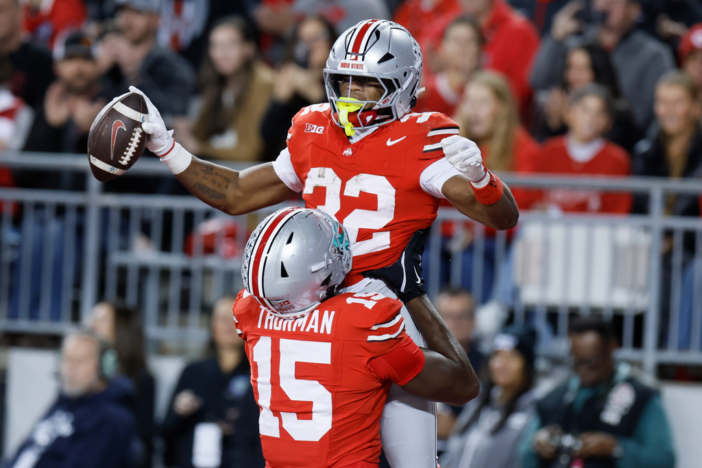 Ohio State running back Isaiah West celebrates after his touchdown against UCLA during the second half of an NCAA college football game, Saturday, Nov. 15, 2025, in Columbus, Ohio. (AP Photo/Jay LaPrete)