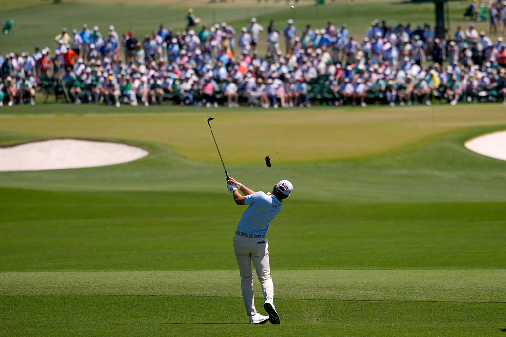 Cameron Young hits from the fairway on the second hole during the third round of the Masters golf tournament at the Augusta National Golf Club, Saturday, April 11, 2026, in Augusta, Ga. (AP Photo/Eric Gay)