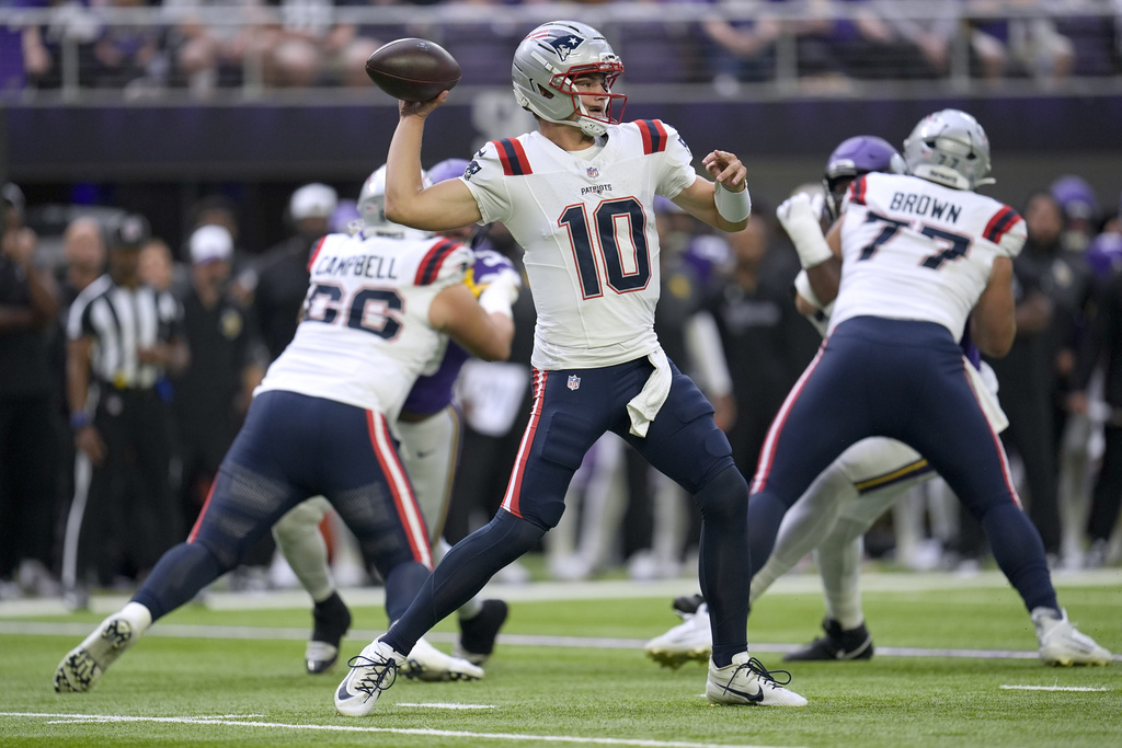 New England Patriots quarterback Drake Maye throws during the first half of a preseason NFL football game against the Minnesota Vikings Saturday, Aug. 16, 2025, in Minneapolis. (AP Photo/Abbie Parr)