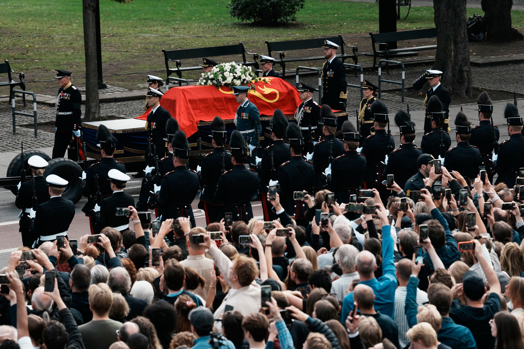 The coffin of Norway's King Harald V is followed in the procession route for his funeral as it arrives at Oslo Cathedral in Oslo, Wednesday, Sept. 9, 2026. (AP Photo/Markus Schreiber)