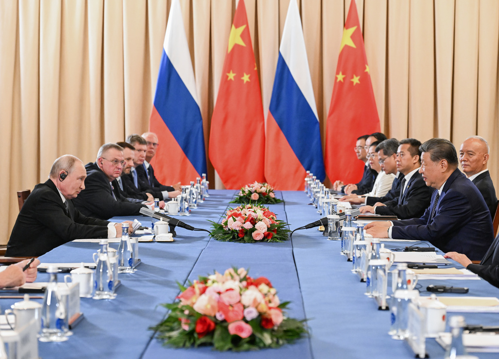 Russian President Vladimir Putin, left, and China's President Xi Jinping attend a meeting on the sidelines of the Shanghai Cooperation Organization (SCO), in Bishkek, Kyrgyzstan, on Monday, Aug. 31, 2026. (Kristina Solovyova, Sputnik, Kremlin Pool Photo via AP)