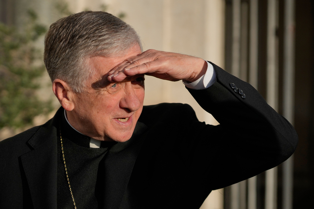 Archbishop of Chicago, Cardinal Blase Cupich, prior to the start of an interview with the Associated Press, in front of St. Bartholomew church in Rome, Thursday, Oct. 9, 2025. (AP Photo/Gregorio Borgia)