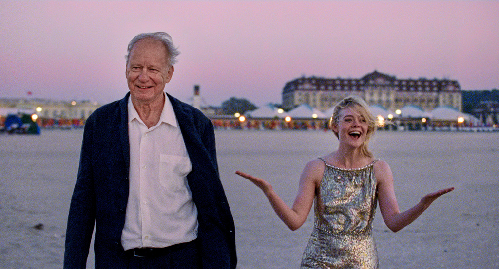 This image released by Neon shows Stellan Skarsgård, left, and Elle Fanning in a scene from "Sentimental Value." (Kasper Tuxen/Neon via AP)