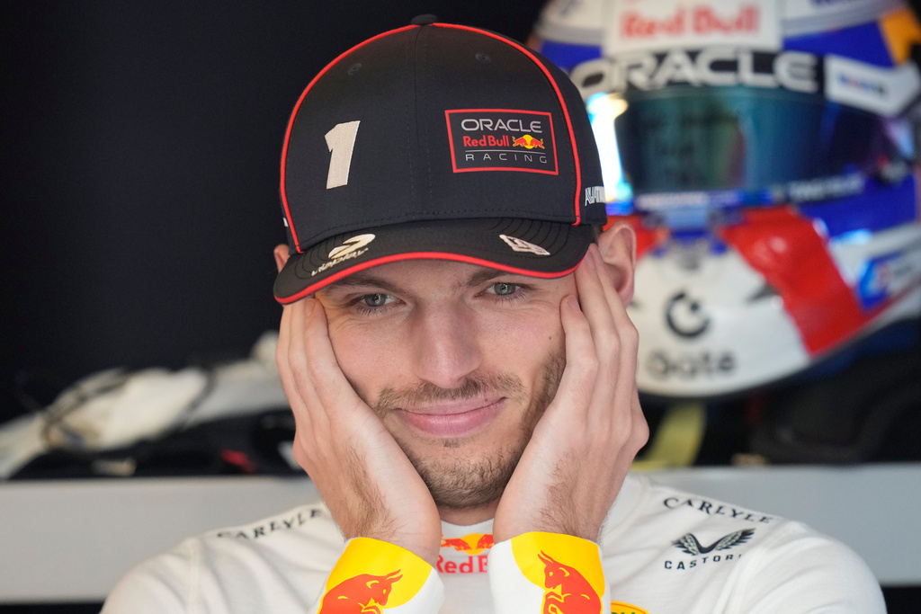 Red Bull driver Max Verstappen of the Netherlands gets ready for the first practice for the he Abu Dhabi Formula One Grand Prix in Abu Dhabi, United Arab Emirates, Friday, Dec. 5, 2025. (AP Photo/Darko Bandic)