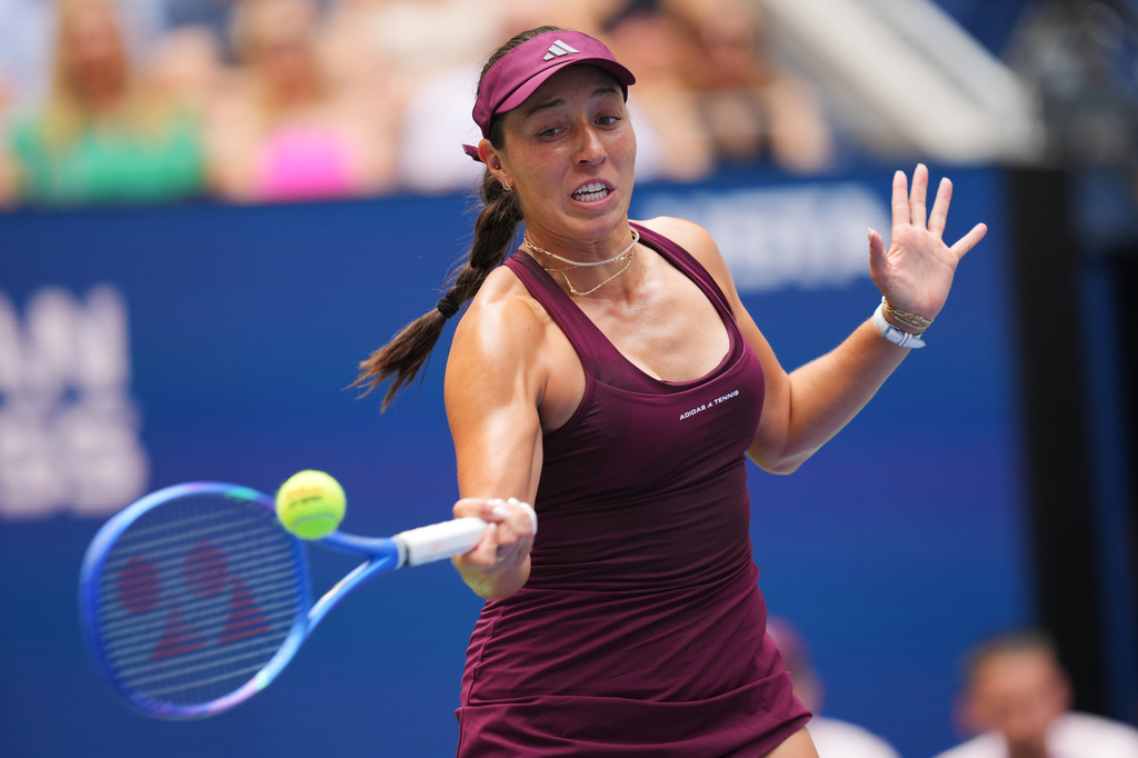 Jessica Pegula, of the United States, returns the ball to Elena-Gabriela Ruse, of Romania, during the first round of the U.S. Open tennis championships Sunday, Aug. 30, 2026, in New York. (AP Photo/Kirsty Wigglesworth)