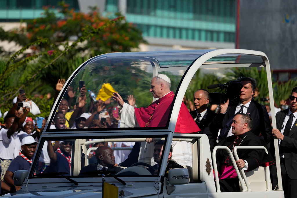 Pope Leo XIV waves after arriving in Luanda, Angola, Saturday, April 18, 2026 on the sixth day of his 11-day pastoral visit to Africa. (AP Photo/Themba Hadebe)