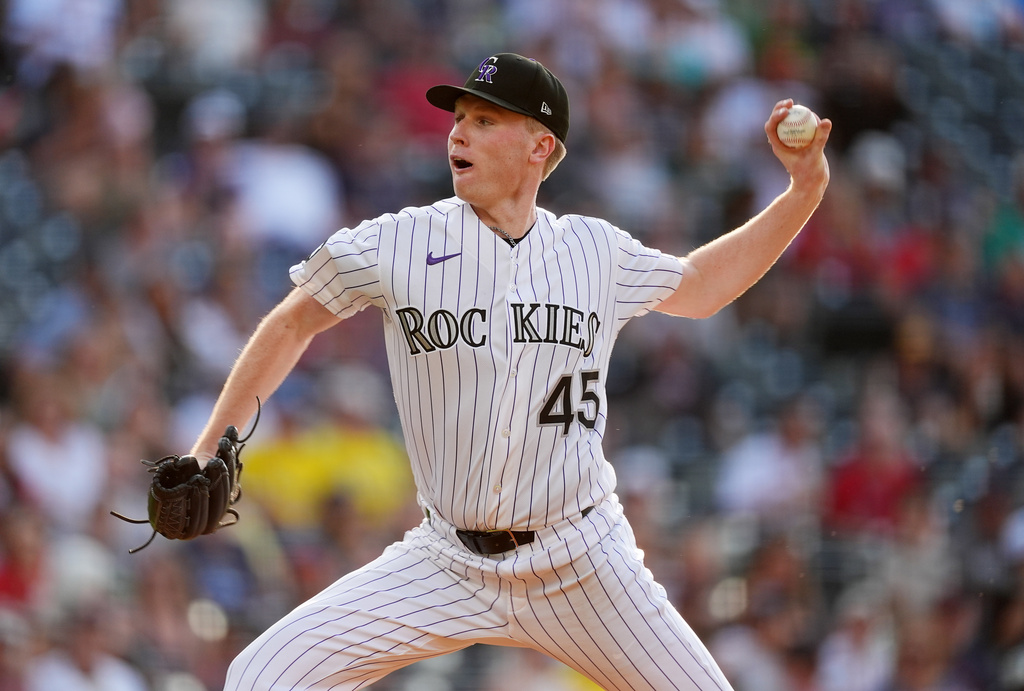 Colorado Rockies starting pitcher Sean Sullivan works against the Boston Red Sox in the first inning of a baseball game, Tuesday, June 23, 2026, in Denver. (AP Photo/David Zalubowski)